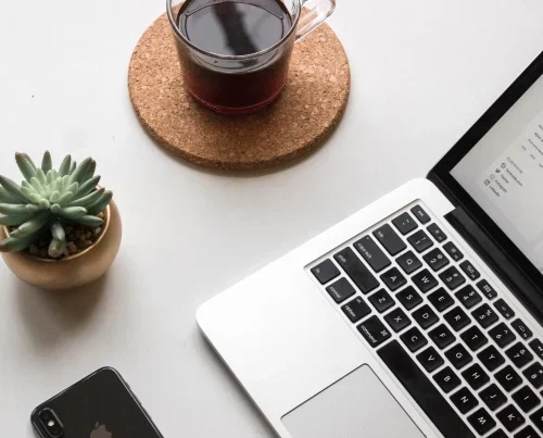 Online counselling - image of laptop and a phone